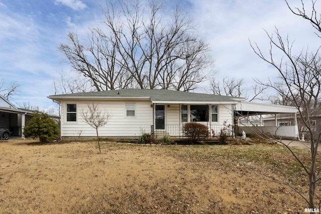 single story home with a carport and a porch