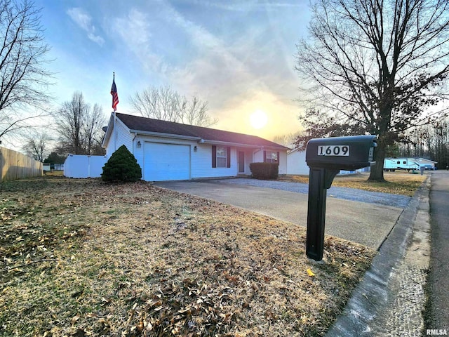 single story home with a garage