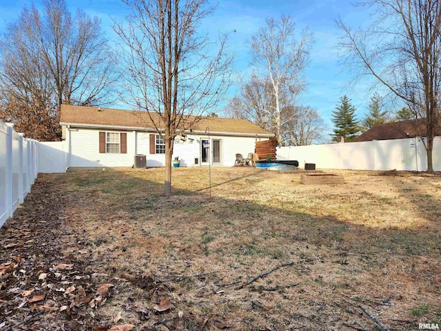 ranch-style house with a garage and a front yard