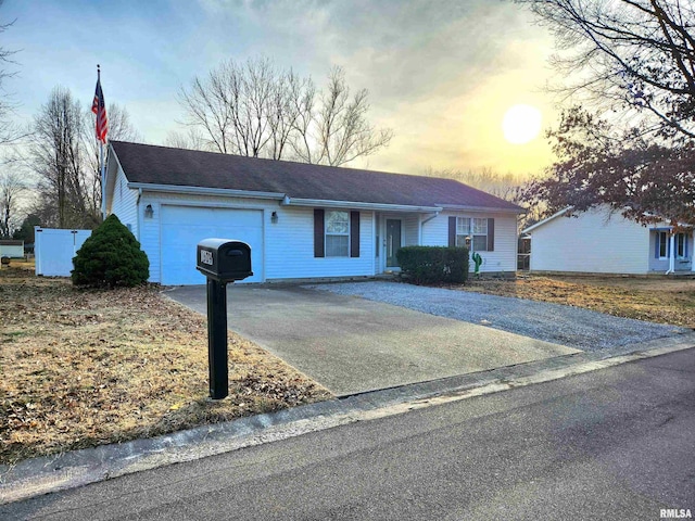 ranch-style home with a garage