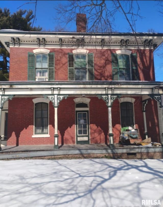 italianate-style house with a porch