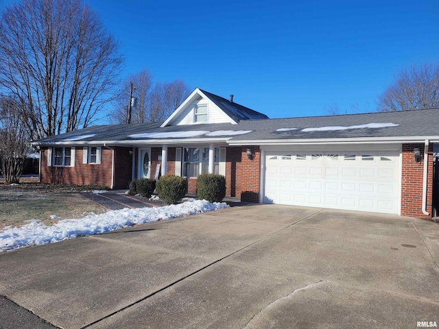 ranch-style house featuring a garage