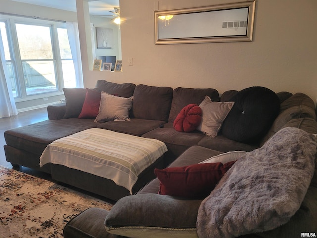 living room featuring ceiling fan