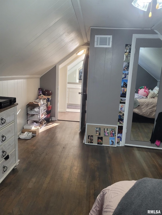 bonus room featuring hardwood / wood-style flooring and lofted ceiling