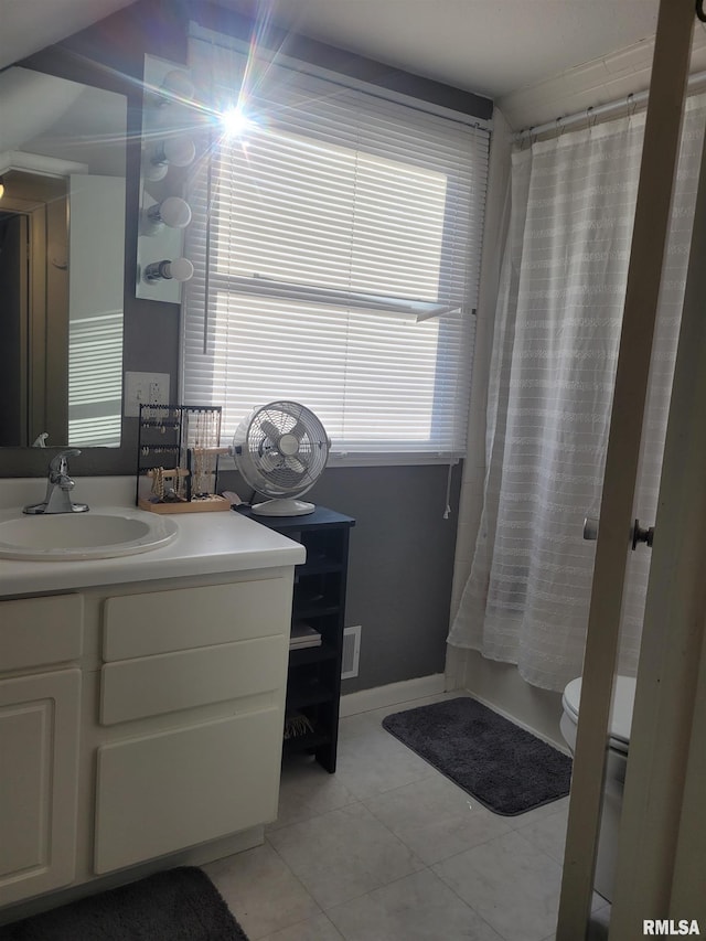 full bathroom featuring vanity, tile patterned flooring, visible vents, toilet, and a shower with shower curtain