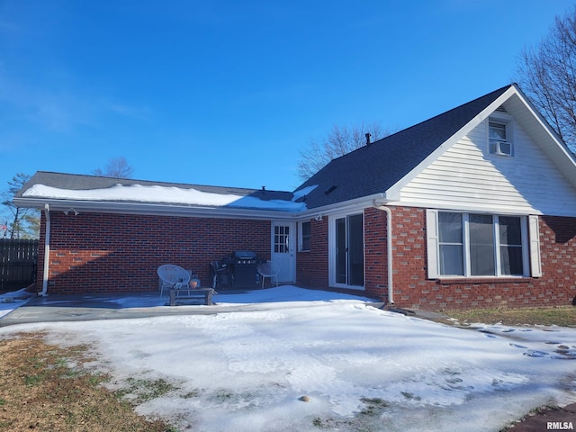 view of snow covered property