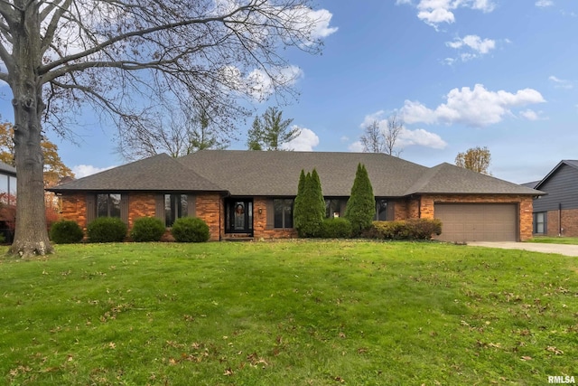 ranch-style house with a garage and a front yard