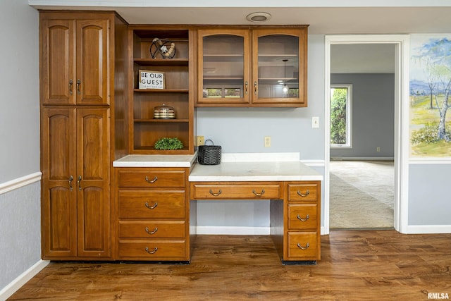 interior space featuring dark carpet
