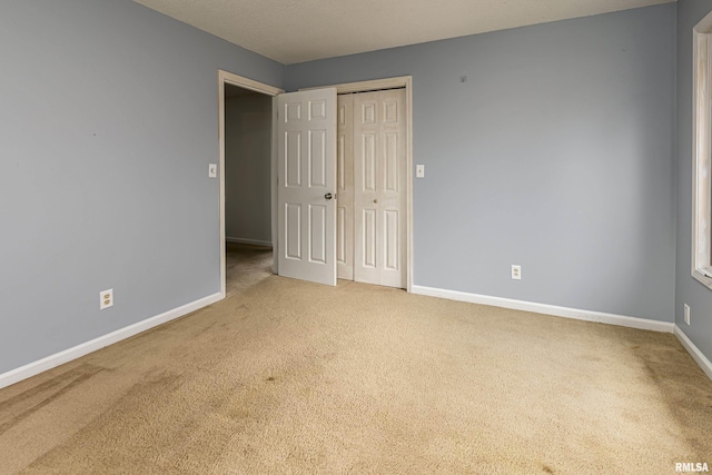 spare room featuring carpet floors