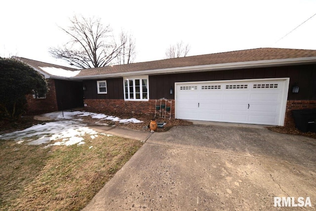 ranch-style home featuring a garage