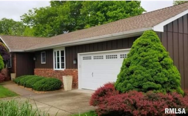 single story home with a garage