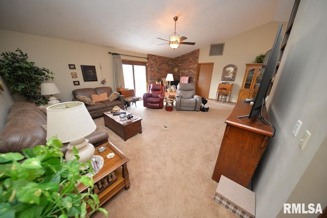 carpeted living room with vaulted ceiling and ceiling fan