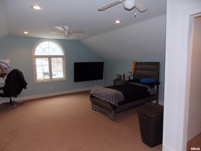 bedroom with vaulted ceiling, carpet floors, and ceiling fan