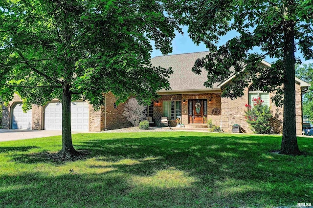 view of front of house featuring a garage, a front yard, and a porch