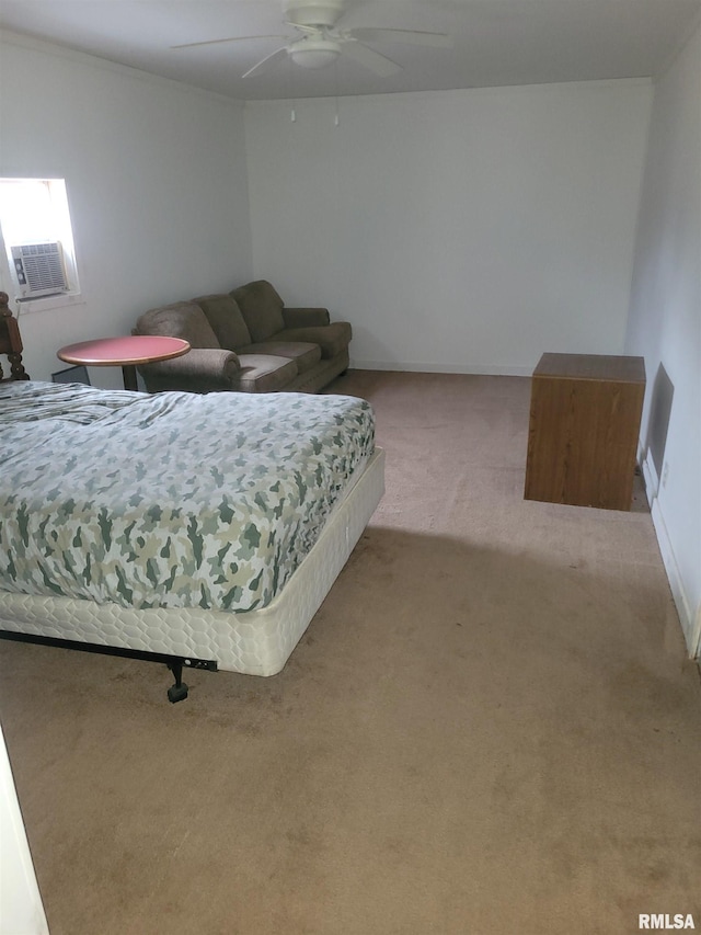 carpeted bedroom featuring cooling unit and ceiling fan