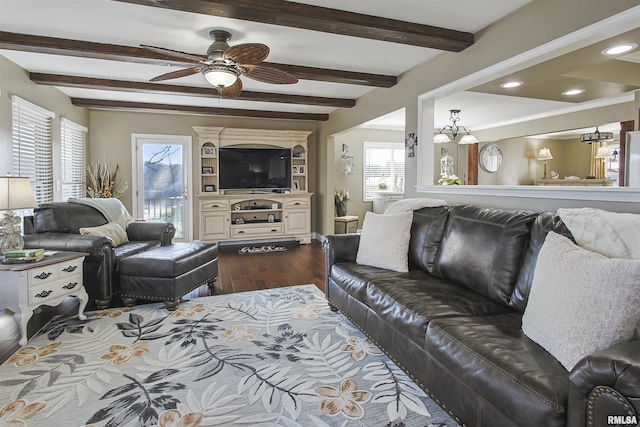 living room featuring beamed ceiling, ceiling fan, and wood-type flooring