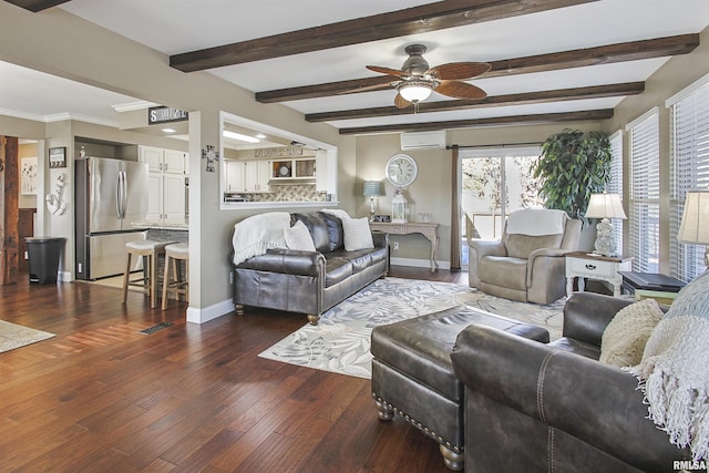 living room featuring dark wood-type flooring, a wall unit AC, beamed ceiling, and ceiling fan