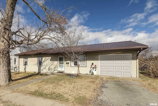 ranch-style home with a garage