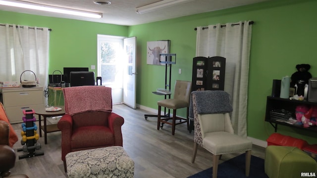 living area featuring light wood-type flooring