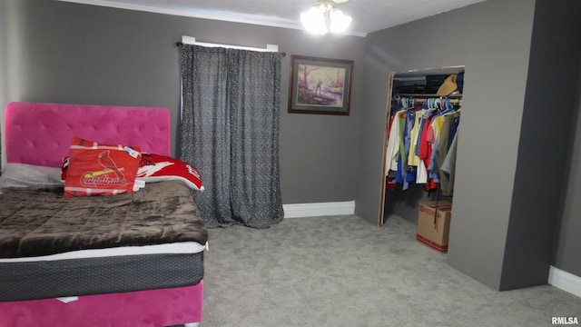 carpeted bedroom featuring a closet