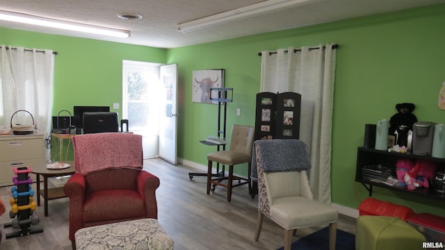 living area with light wood-type flooring