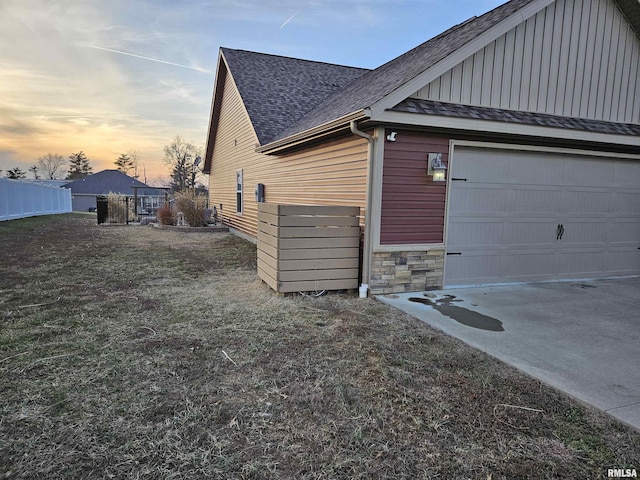 view of property exterior at dusk