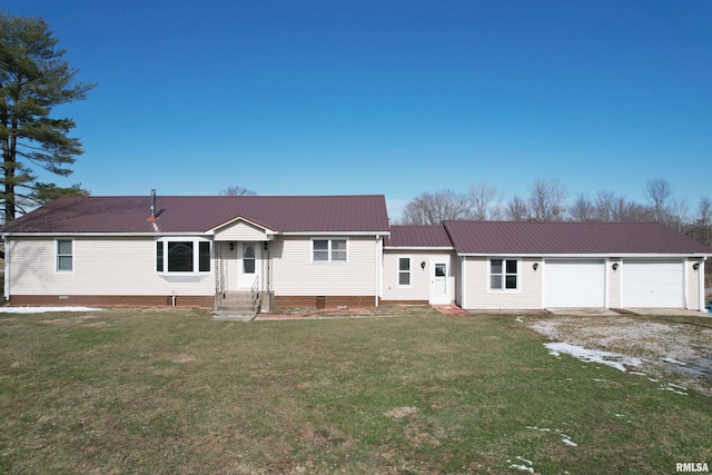 view of front of home with a garage and a front yard