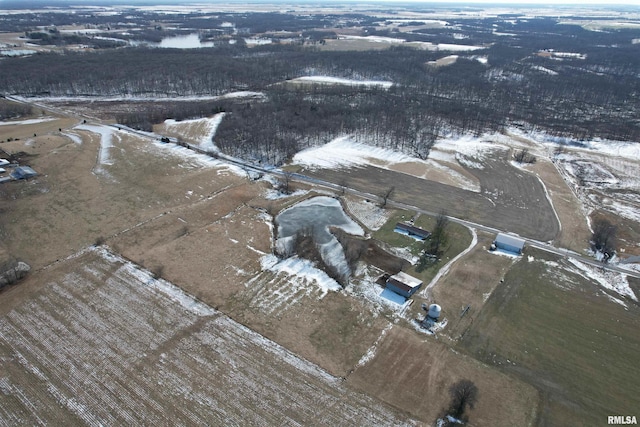 snowy aerial view with a rural view