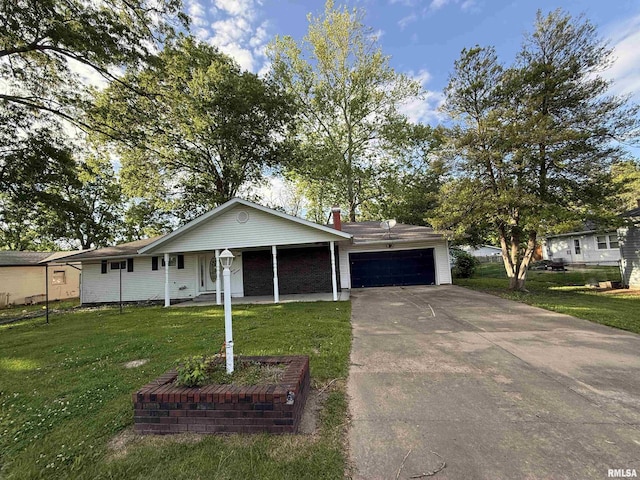 1117 E Ash St, Herrin, IL 62948 - ranch-style home featuring a garage, a front lawn, a porch, concrete driveway, and a chimney