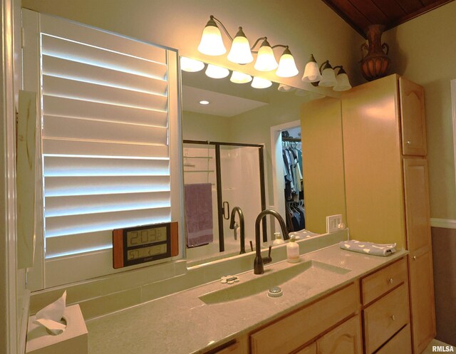 205 E Jennings, Salem, IL 62881 - bathroom featuring a stall shower, vanity, and a walk in closet