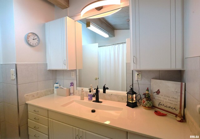 205 E Jennings, Salem, IL 62881 - bathroom with vanity, tile walls, backsplash, and a shower with shower curtain
