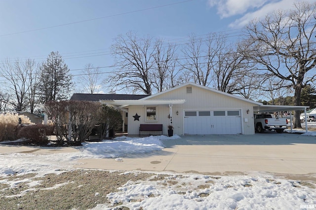 view of front facade featuring a garage and a carport