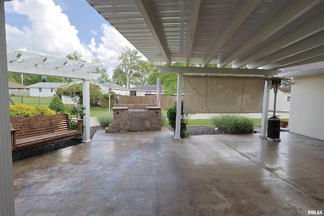 205 E Jennings, Salem, IL 62881 - view of patio featuring an outdoor kitchen, a pergola, and fence