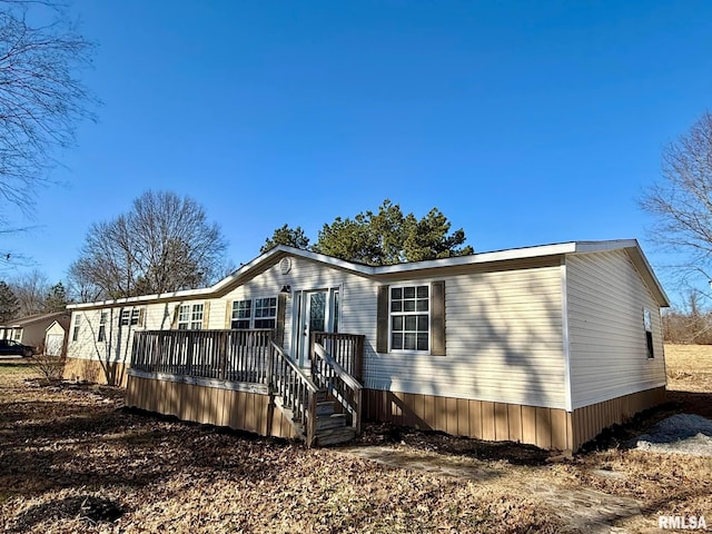 manufactured / mobile home featuring a deck