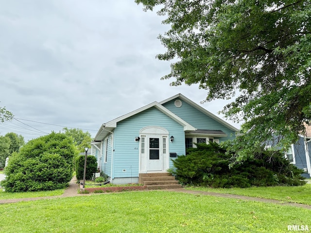 1812 N Ave, Metropolis, IL 62960 - view of front of property featuring entry steps and a front lawn