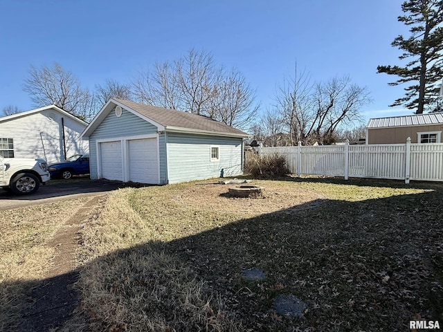 detached garage with fence