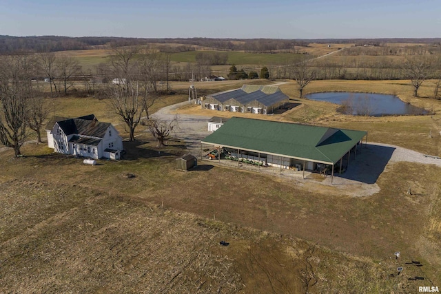 aerial view featuring a water view and a rural view