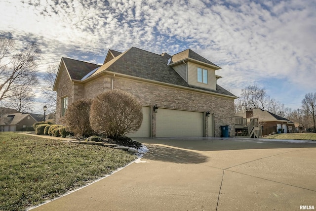 view of side of home with a garage