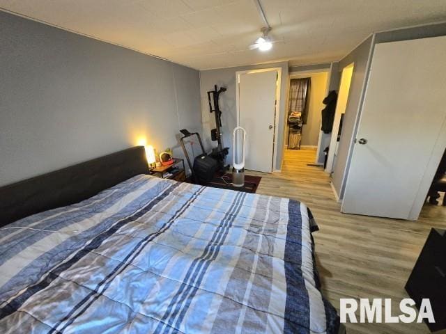 unfurnished bedroom featuring light wood-type flooring