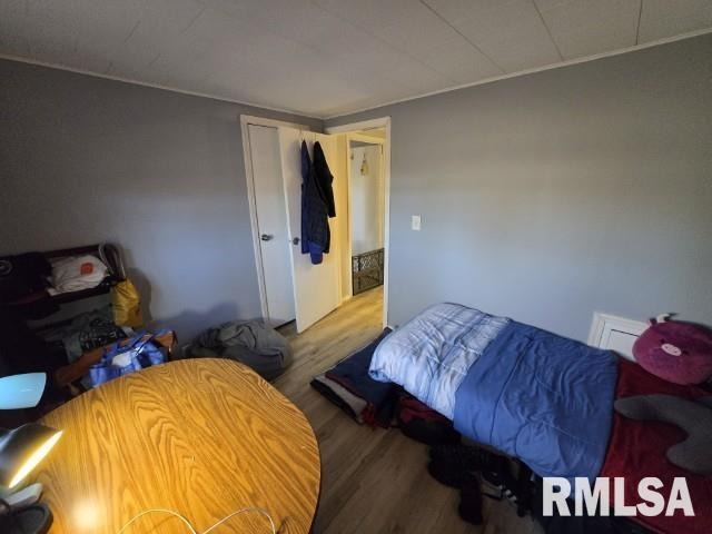 bedroom featuring hardwood / wood-style floors