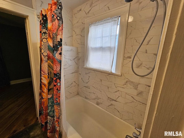 bathroom featuring shower / tub combo