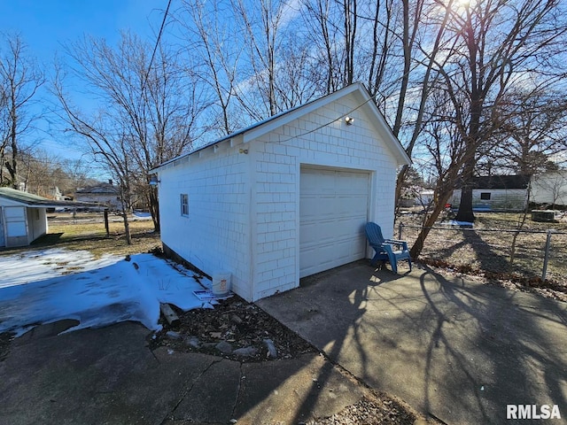 view of snow covered garage