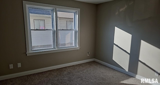 empty room with carpet flooring