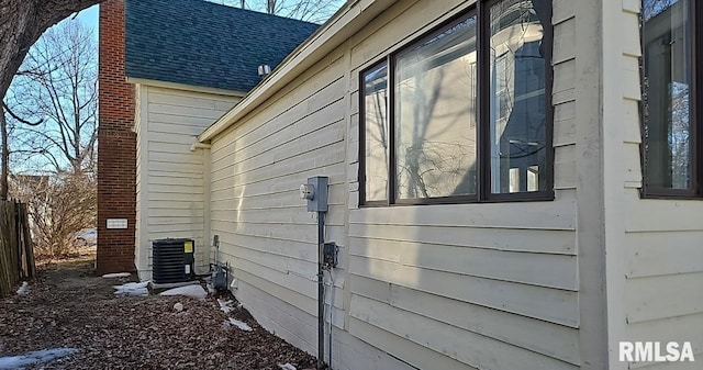 view of home's exterior featuring cooling unit