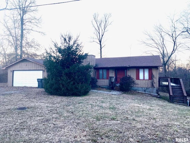 single story home featuring a garage