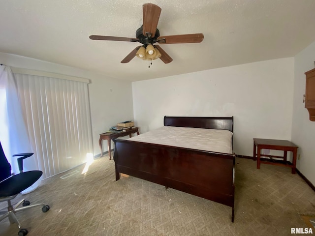 bedroom featuring ceiling fan and carpet floors