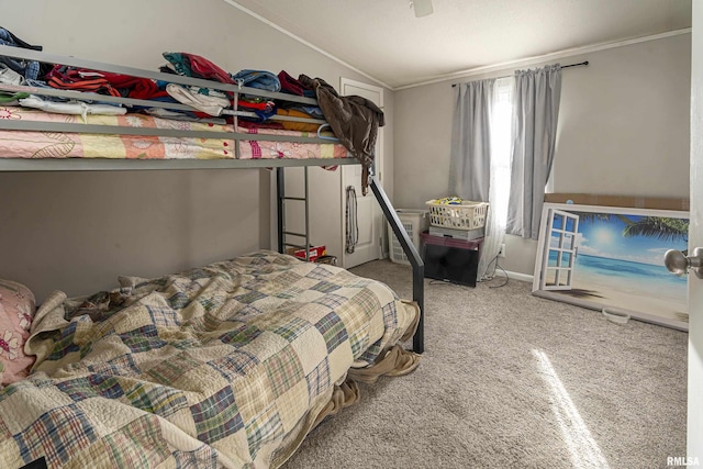 carpeted bedroom featuring ceiling fan and ornamental molding