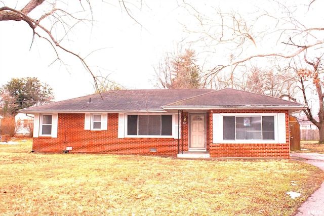 ranch-style house with a front yard