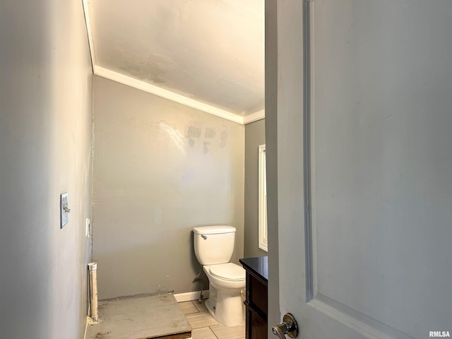 bathroom with toilet and vanity