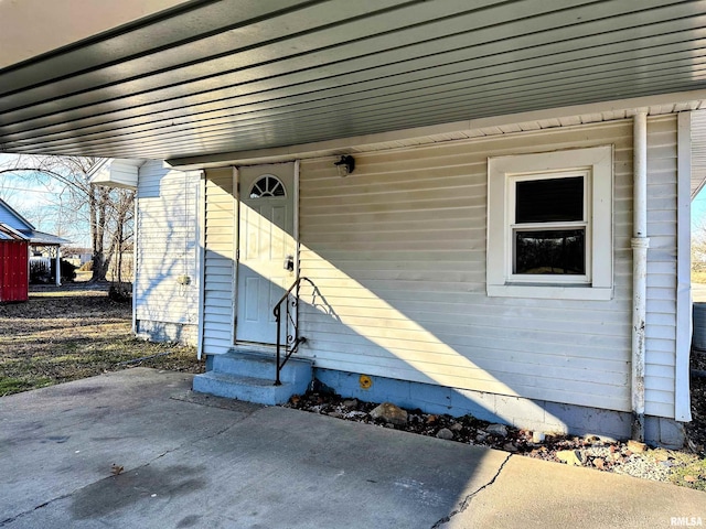 doorway to property featuring a patio